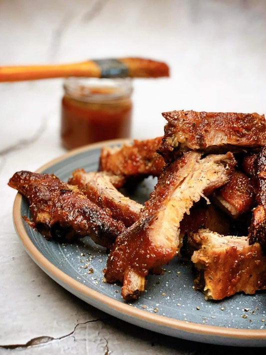 Cote levée de porc, glace au rhum épicé et au sirop d’érable