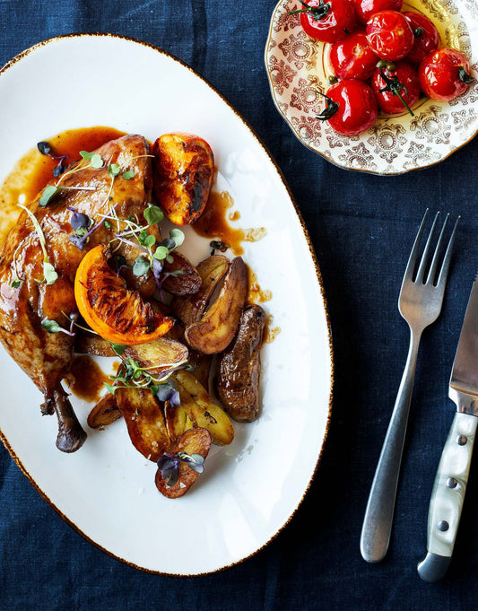 Cuisses de poulet confites à l’huile d’olive et aux agrumes