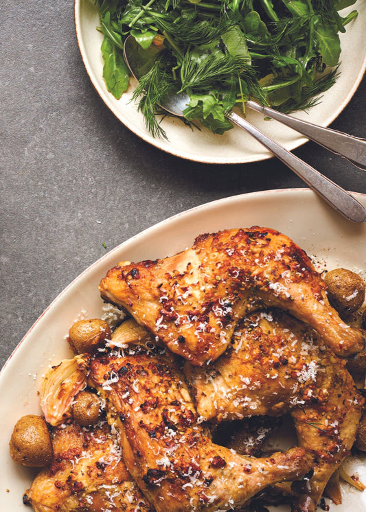 Cuisses de poulet croustillantes et fondantes, au parmezan, au citron vert et au poivre