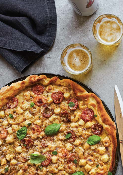 Fine pizza aux fruits de mer et aux agrumes