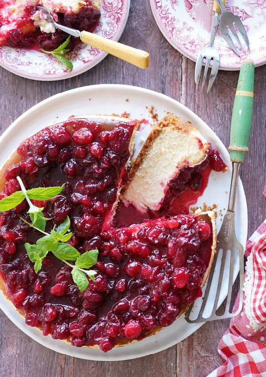 Gâteau au fromage, canneberges et oranges