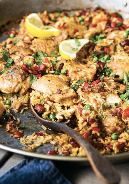 Haut de cuisse de poulet au riz, comme une paella