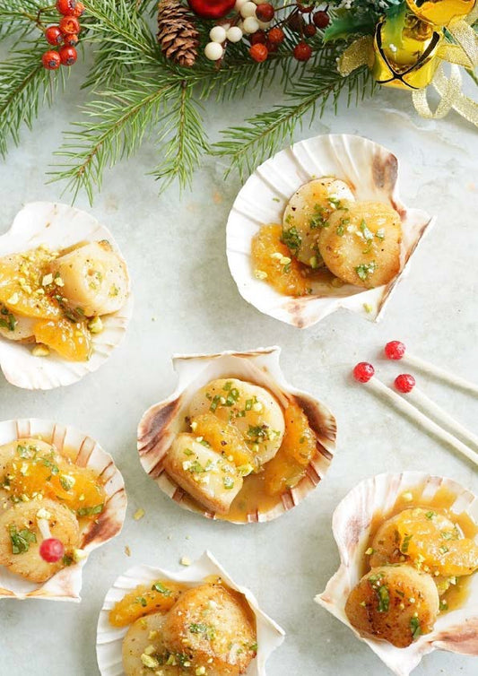 Pétoncles poêlés à la clémentine et pistaches