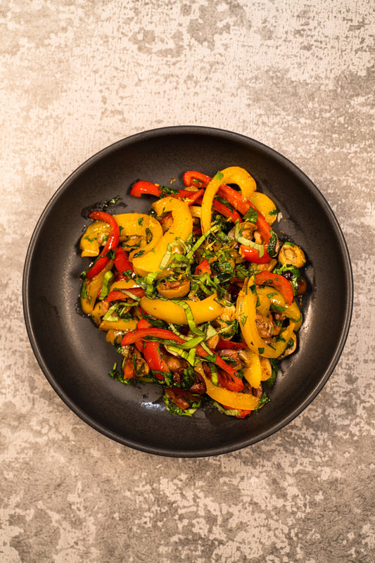 Poivrons sautés aux olives et zeste d’agrumes