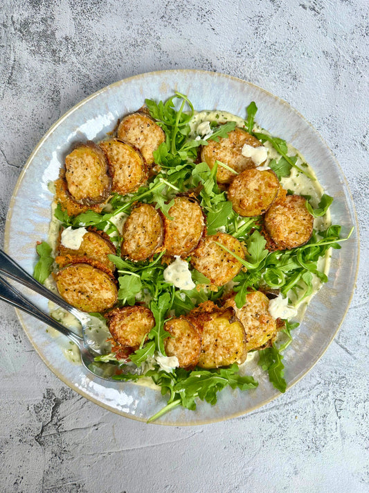 Salade tiède de patates au parmesan, roquette et aïoli