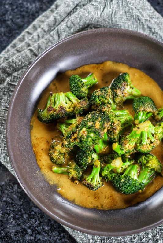 Sautée de brocoli, beurres au citron et cheddar
