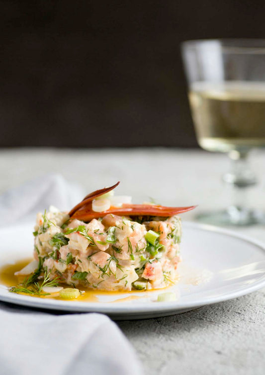 Tartare de saumon et de homard, huile de homard aux fines herbes