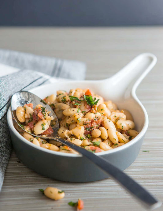 Fricassée de haricots blancs à salsa de tomates à l’origan