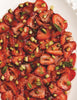 Carpaccio de fraises à la menthe, caramel de porto et poivres