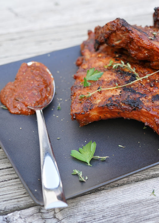 Côtes levées de dos de porc à la bière blonde, glaze barbecue