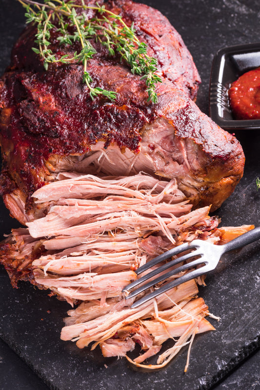 Épaule de porc à l’étouffée, compotée de tomates à la bière irlandaise (porc effiloché)