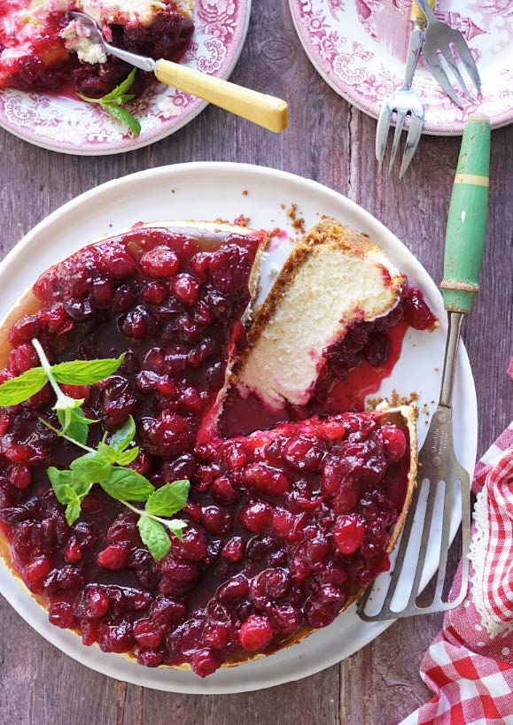 Gâteau au fromage, canneberges et oranges