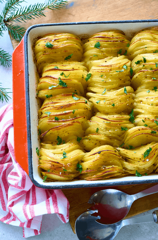 Millefeuille de pommes de terre au gras de canard et herbes fraîches