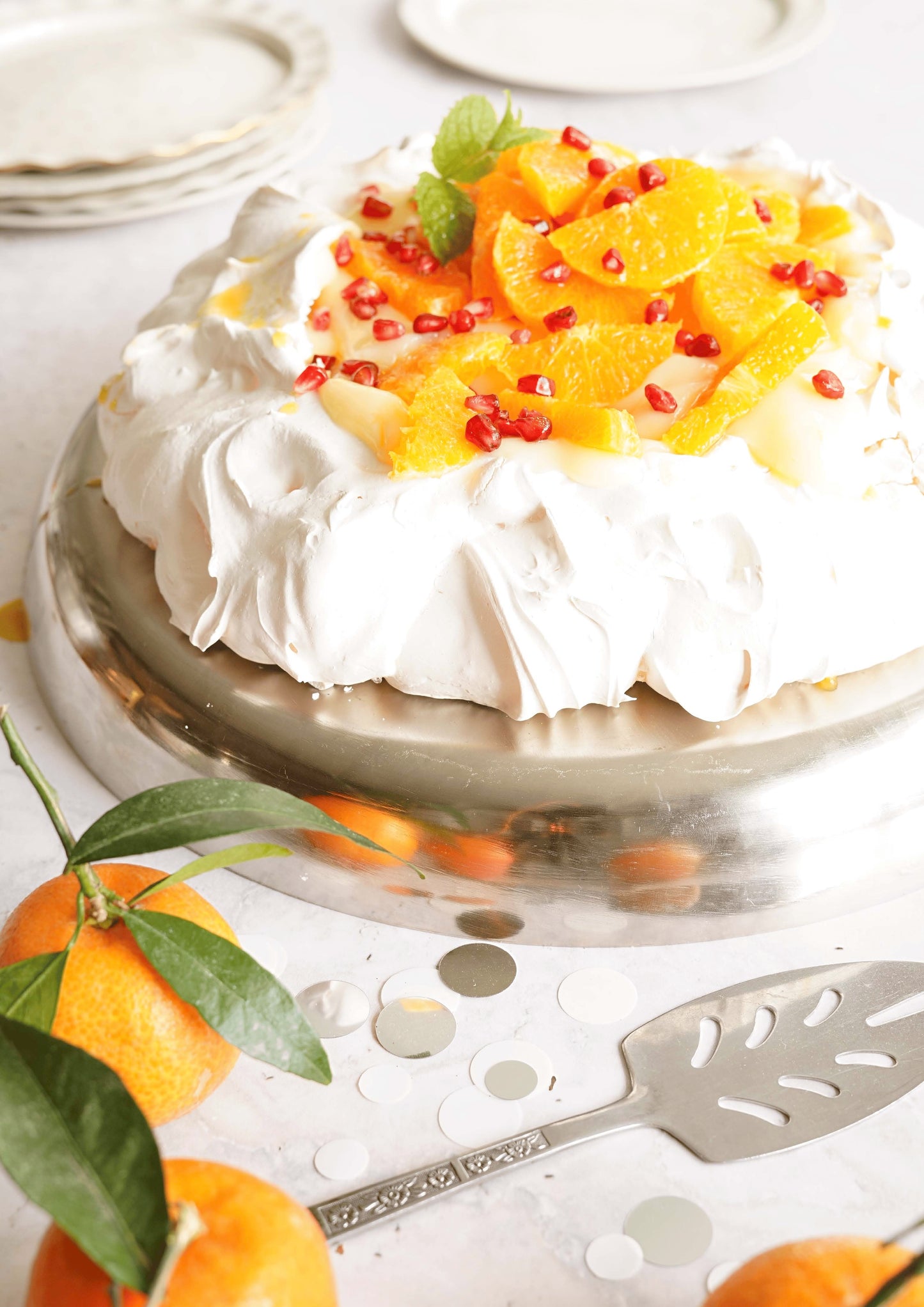 Pavlova crème pâtissière à la clémentine, salade de clémentine et grenade