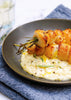 Pétoncles poêlés, compoté d'oignons doux et de pommes au cheddar vieilli