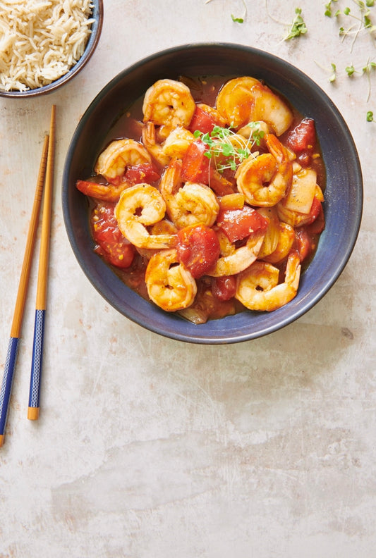 Sauté de crevettes aux tomates et gingembre à l’asiatique