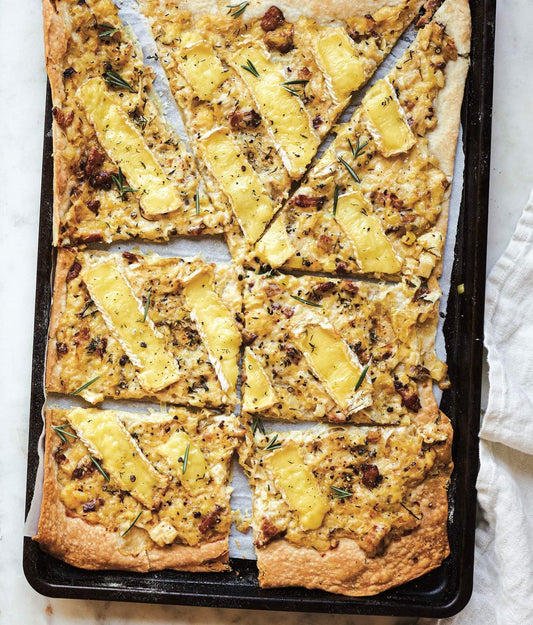 Tombée de poireaux aux lardons et au brie sur croûte feuilletée