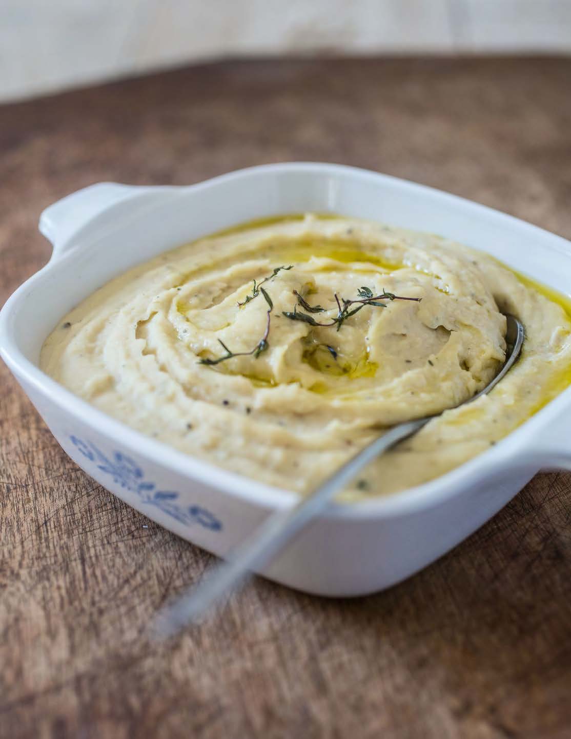 Purée de haricots blancs à l’ail confit